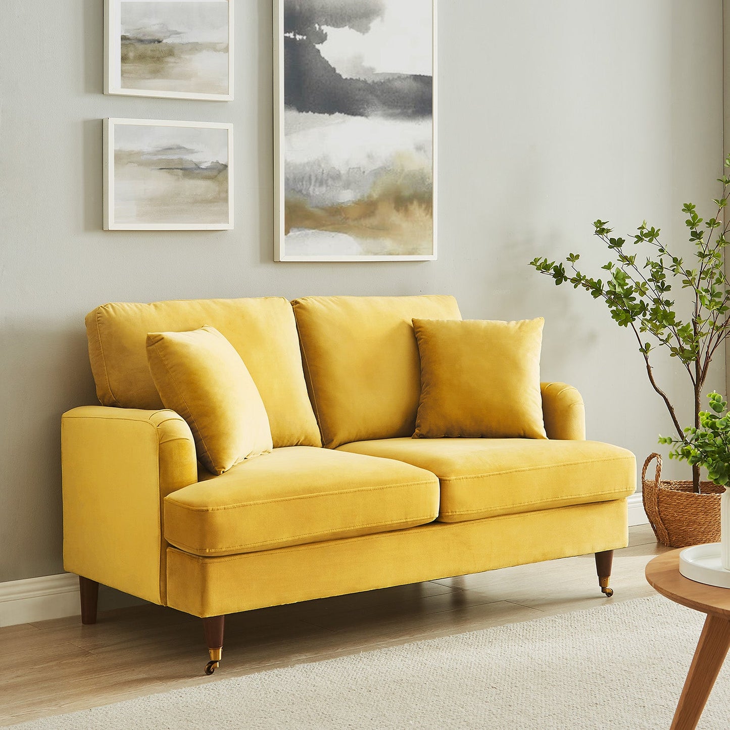 Brigette 2-Seater Mustard Velvet Sofa with Antique Brass Castor Legs