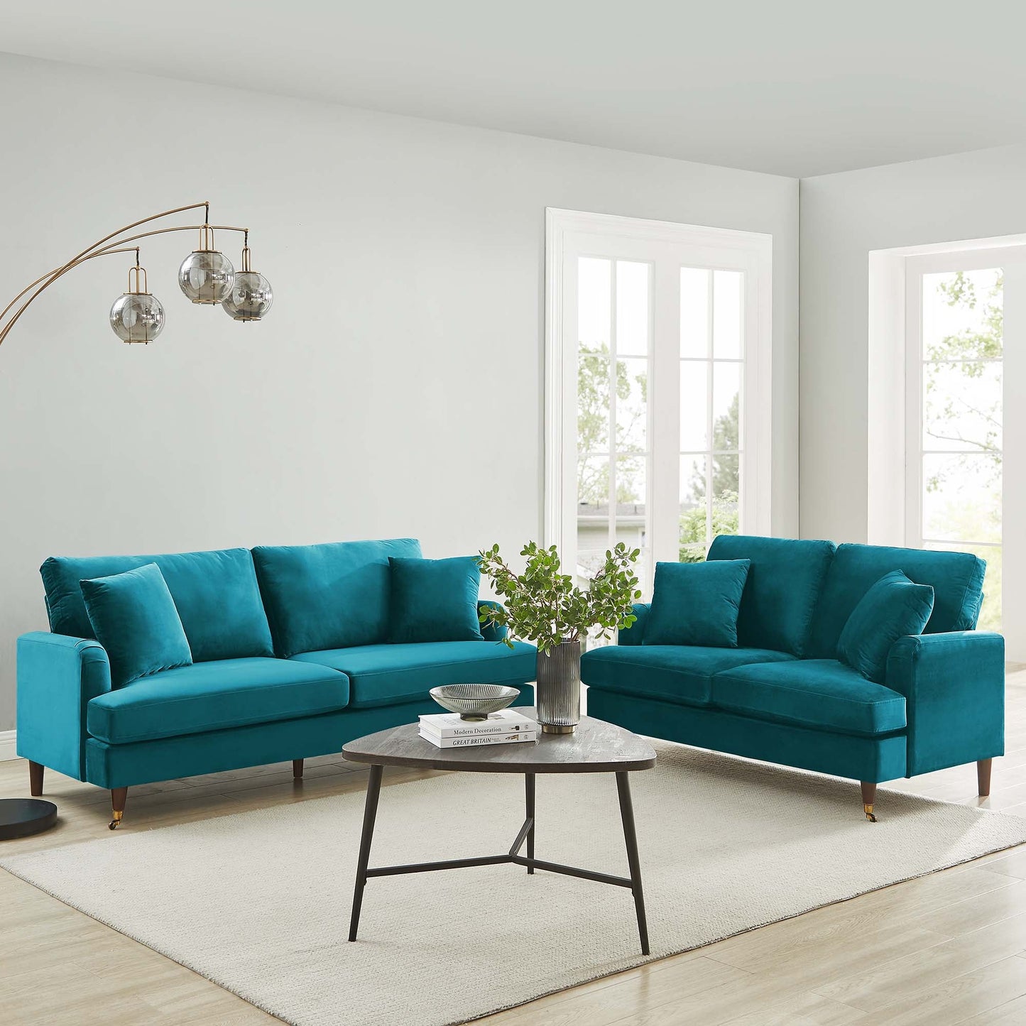 Brigette 2-Seater Teal Velvet Sofa with Antique Brass Castor Legs